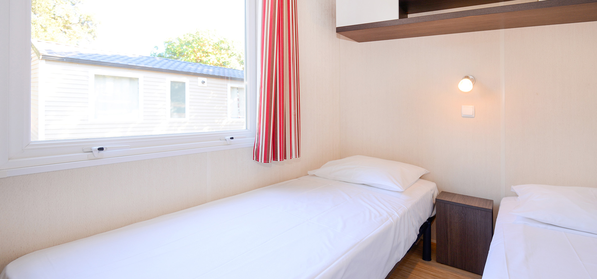 Camping la vetta location MH confort 3CH LIT SUP chambre enfant